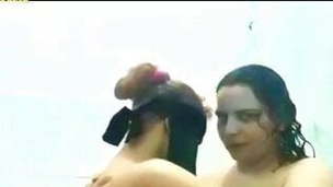 Two Egyptian girls take a shower and play with their pussies